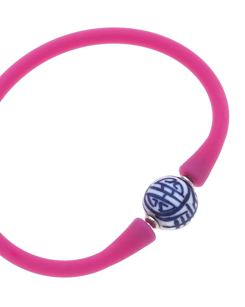 Front of a size O/S Bali Chinoiserie Bead Silicone Bracelet in Magenta in Magenta by Judson & Company. | dia_product_style_image_id:330412